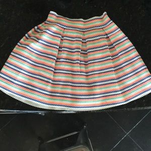 coral and blue patterned skirt
